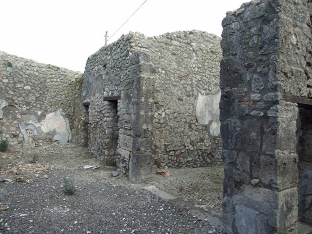 IX.3.15 Pompeii.  March 2009.  Room 11.  Looking east along south portico, with doors to rooms 8,9 and 10.