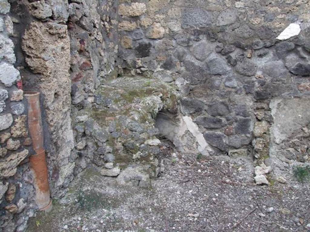 IX.3.15 Pompeii.  March 2009.   Room 12.  Kitchen area in north west corner of portico, with latrine.