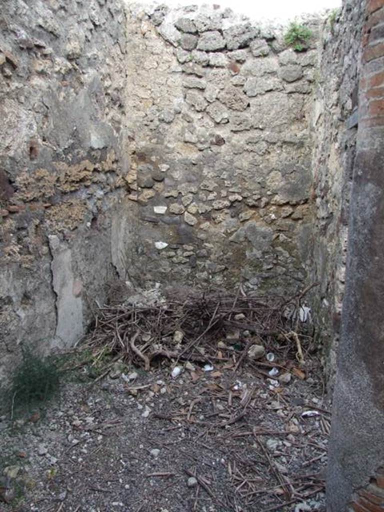 IX.3.15 Pompeii. March 2009. Room 13, small room or storeroom. Looking east from kitchen area.