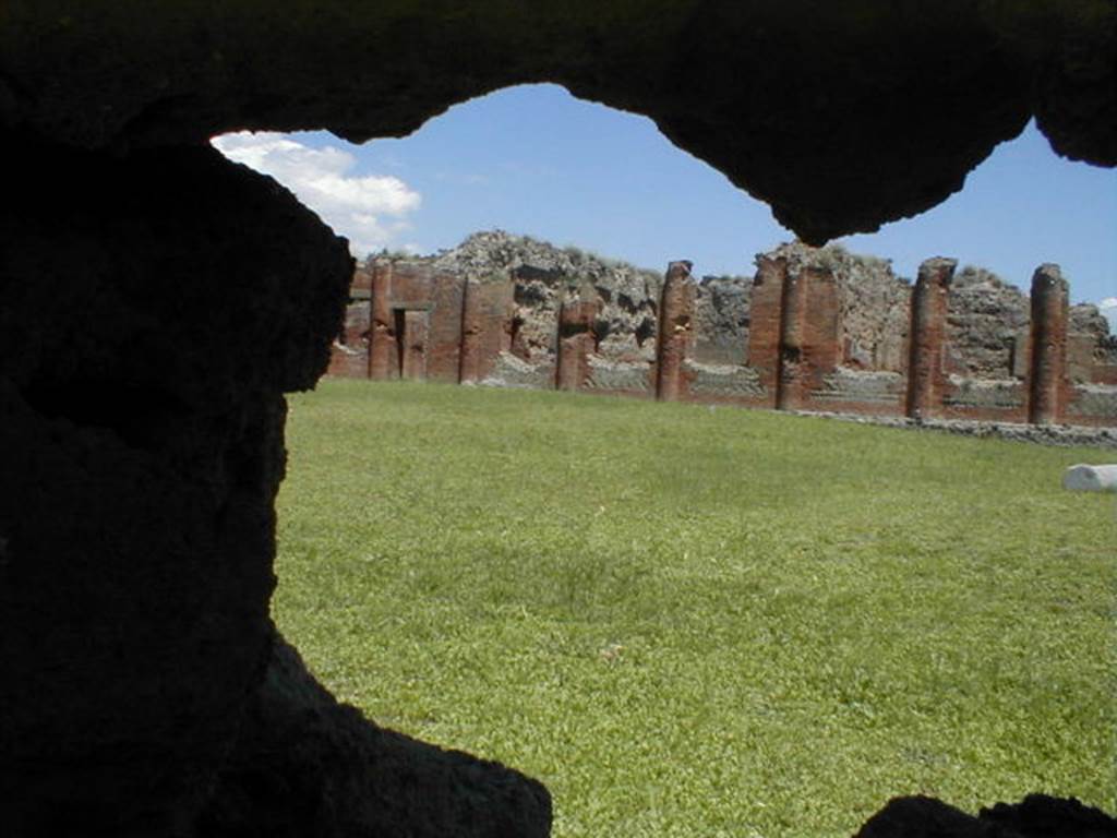 IX.4.6 Pompeii. May 2005. Central Baths through hole in wall at IX.4.6