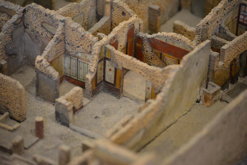 IX.5.18 Pompeii. July 2017. Looking towards rooms on north side of atrium.
Room r, on left, cubiculum p with two doorways one leading into room l (L), with doorway in north wall into room o. 
On the right are rooms in IX.5.6.
From cork model in Naples Archaeological Museum.
Foto Annette Haug, ERC Grant 681269 DÉCOR
