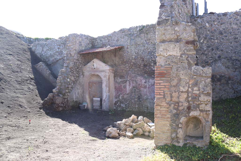 IX.6.8 Pompeii. February 2020. 
Looking south-west across atrium towards lararium, and unexcavated. Photo courtesy of Aude Durand.

