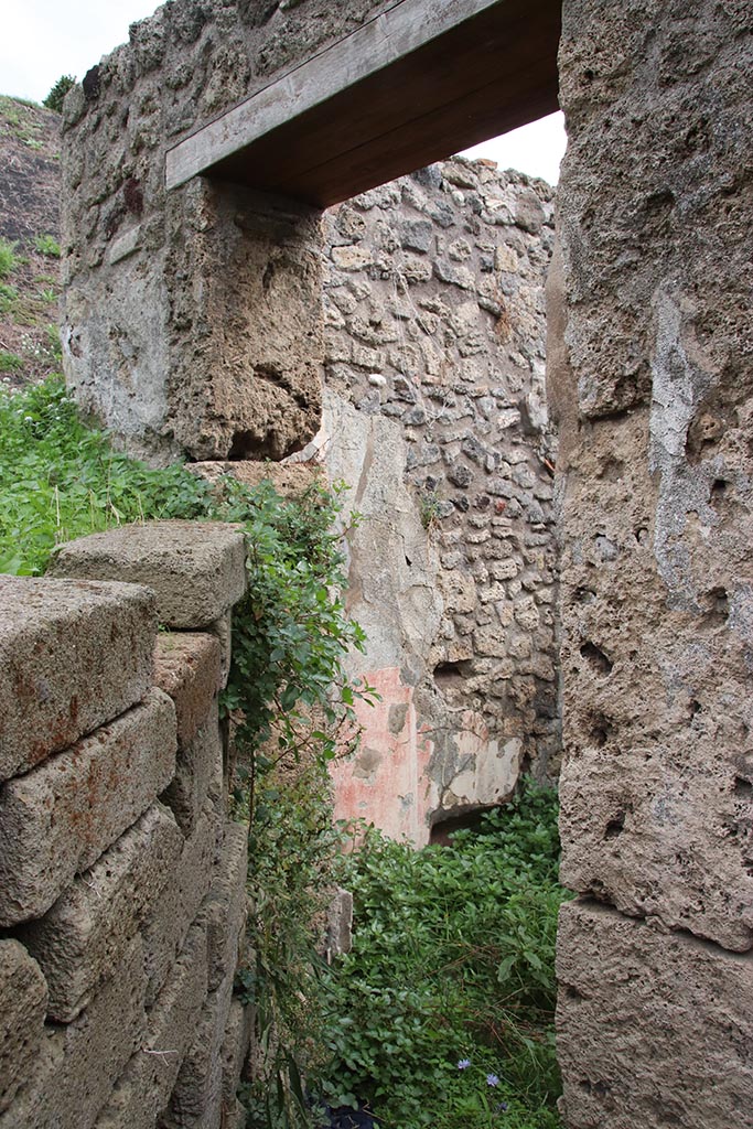 IX.7.16 Pompeii. October 2024. 
Looking towards doorway into room “c”, cubiculum, on south side of atrium. Photo courtesy of Klaus Heese.
