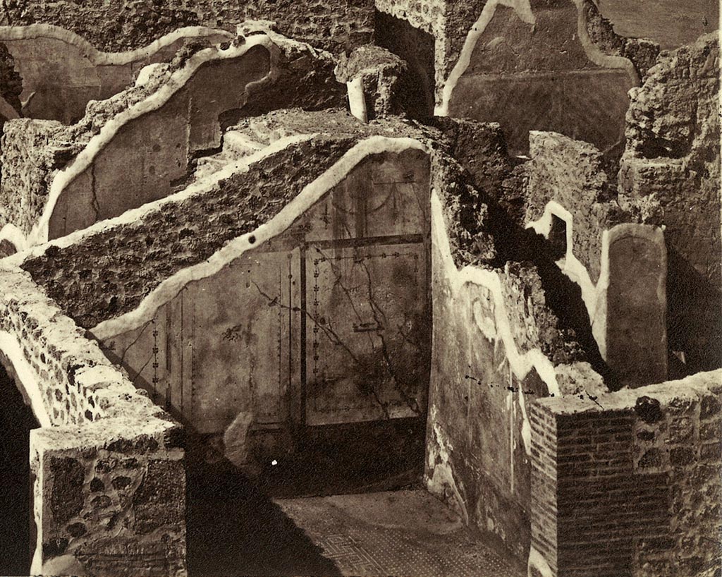 IX.8.c Pompeii. 1860. Detail from old postcard, looking north into exedra.