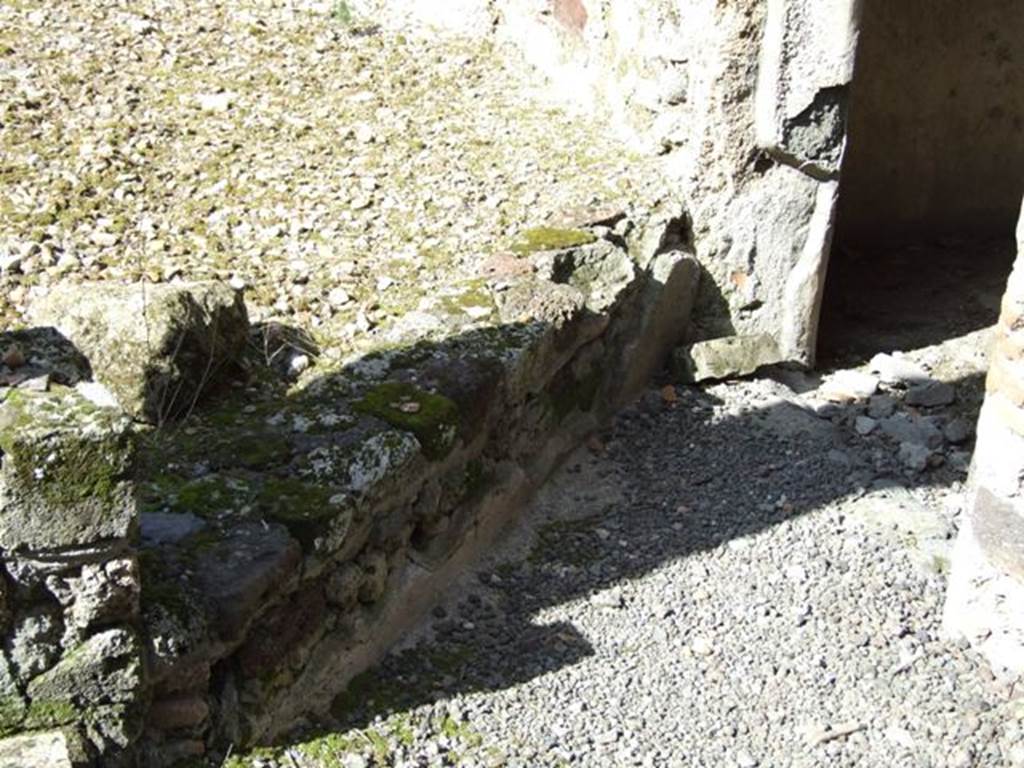 IX.9.c Pompeii.  March 2009.  South east corner of  Peristyle area, with entrance to paved courtyard.