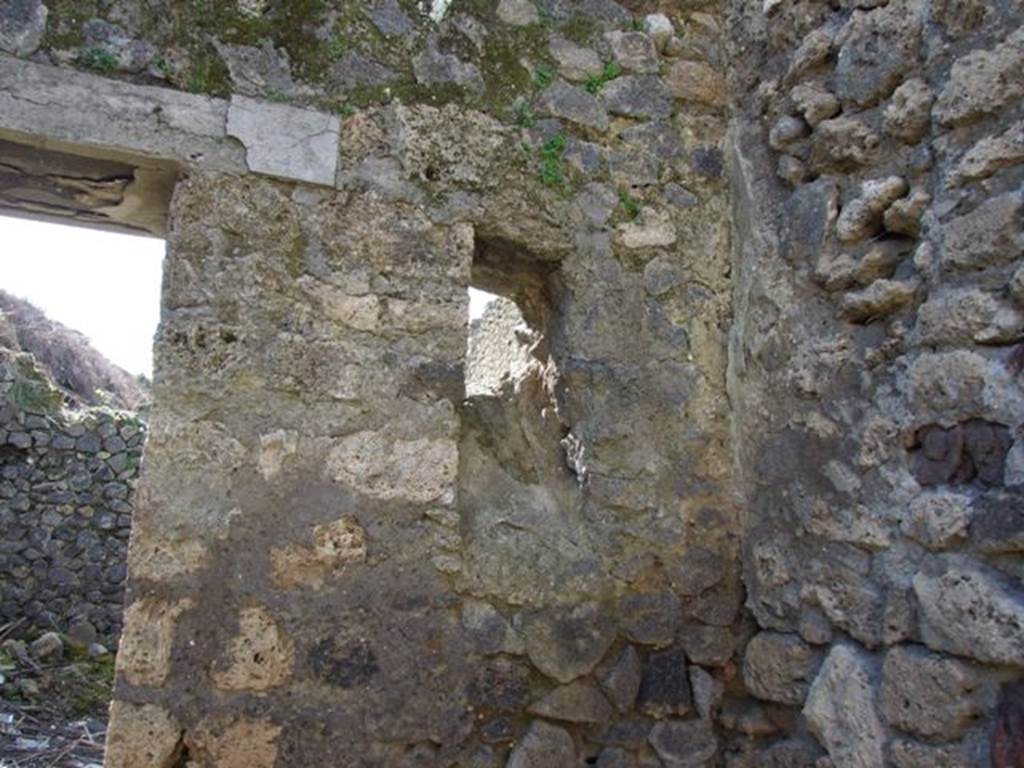 IX.9.g Pompeii. March 2009. North-west corner of atrium, on north side of entrance doorway.