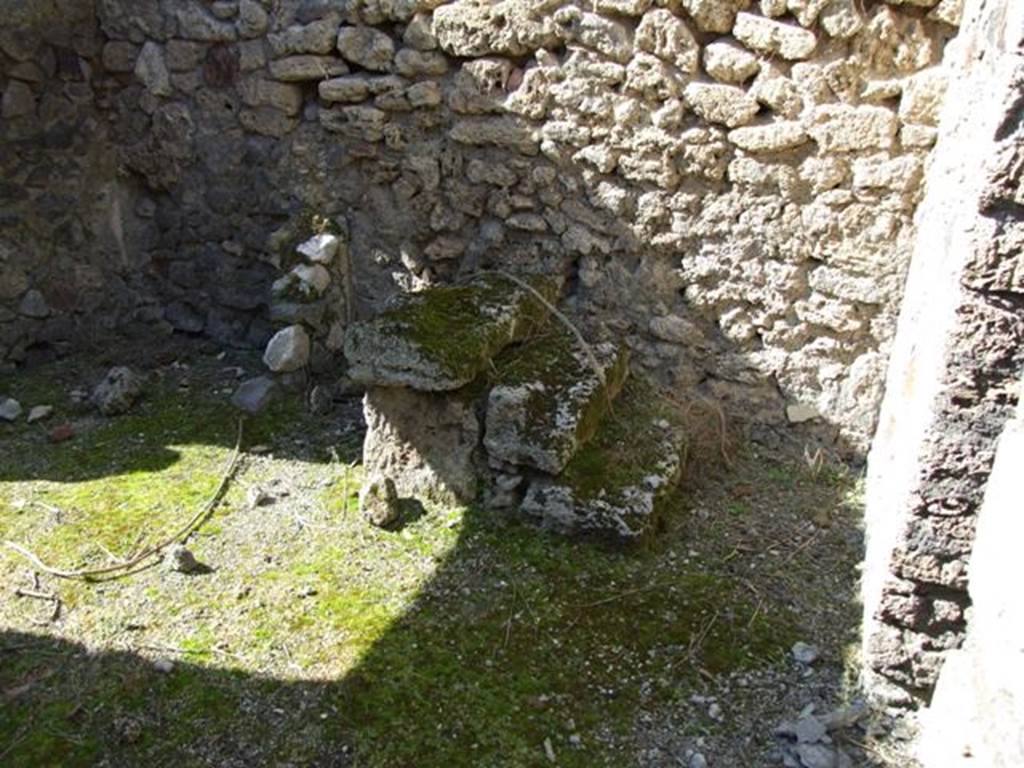 IX.9.g Pompeii. March 2009. Looking north across atrium, to steps to upper floor, and latrine.