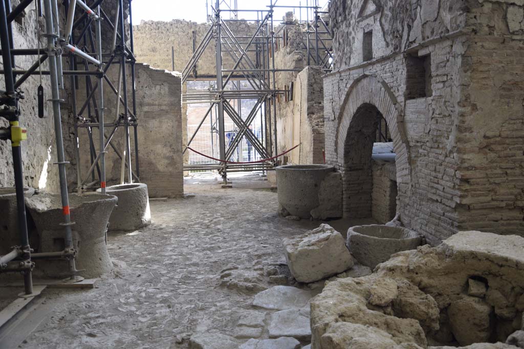 IX.12.6 Pompeii. February 2017. Looking south across the bakery room “e”, from room “f”. Photo courtesy of Johannes Eber.