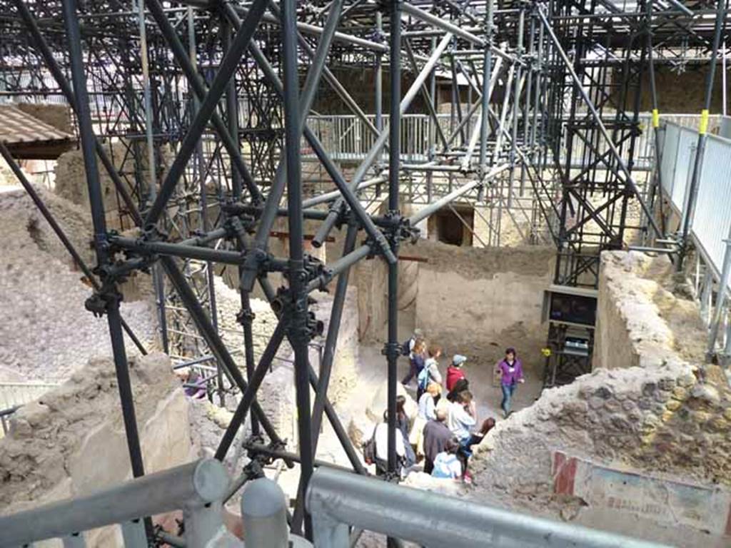 IX.12.6 Pompeii. May 2010. Looking east towards room “f” in the bakery, from area in IX.12.4.