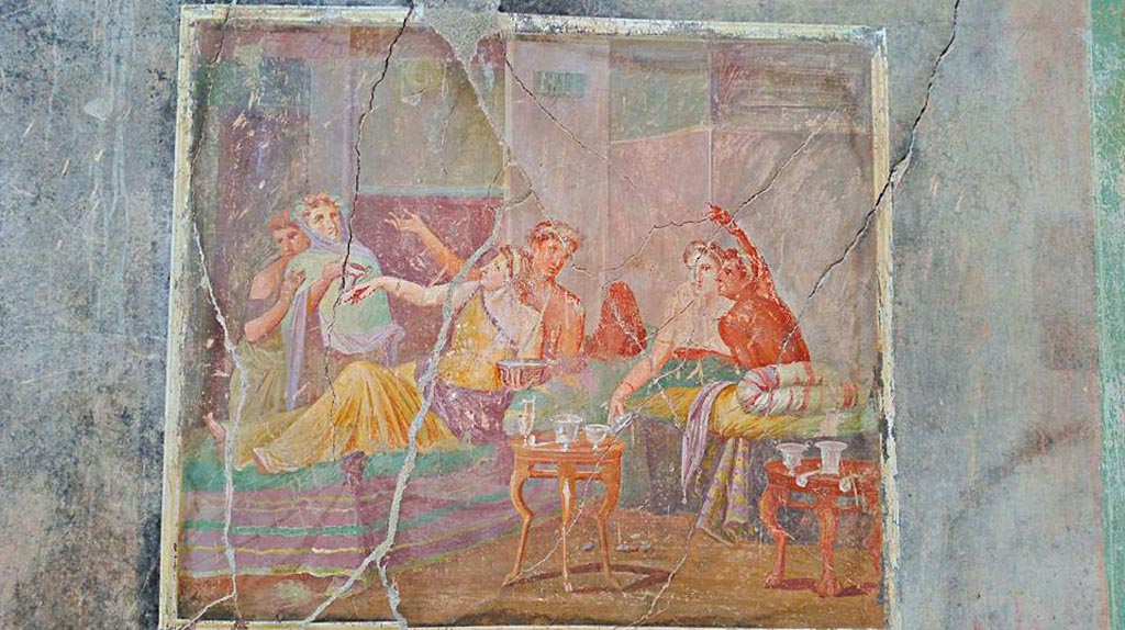 IX.12.6 Pompeii. 2016/2017. 
Room “m”, painting of banqueting scene from west wall of triclinium. Photo courtesy of Giuseppe Ciaramella.

