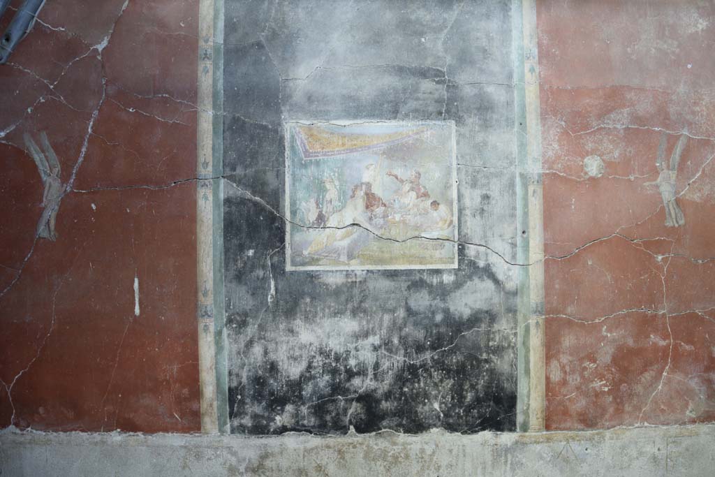 IX.12.6 Pompeii. February 2017. 
Room “m”, painting in centre of north wall with banqueting scene. Photo courtesy of Johannes Eber.
