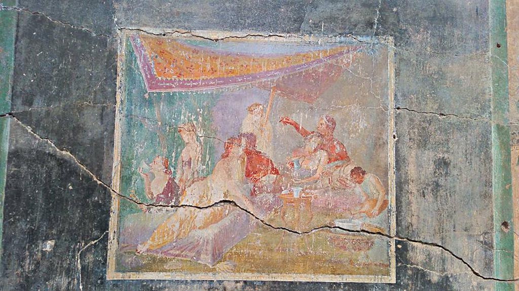 IX.12.6 Pompeii. 2016/2017. Room “m”, north wall of triclinium. Painting of banqueting scene. Photo courtesy of Giuseppe Ciaramella.