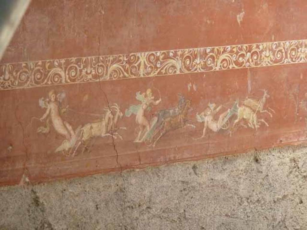 IX.12.9 Pompeii. May 2010. Room “u”, north wall, centre panel. Painting of Cupids on chariots pulled by goats.