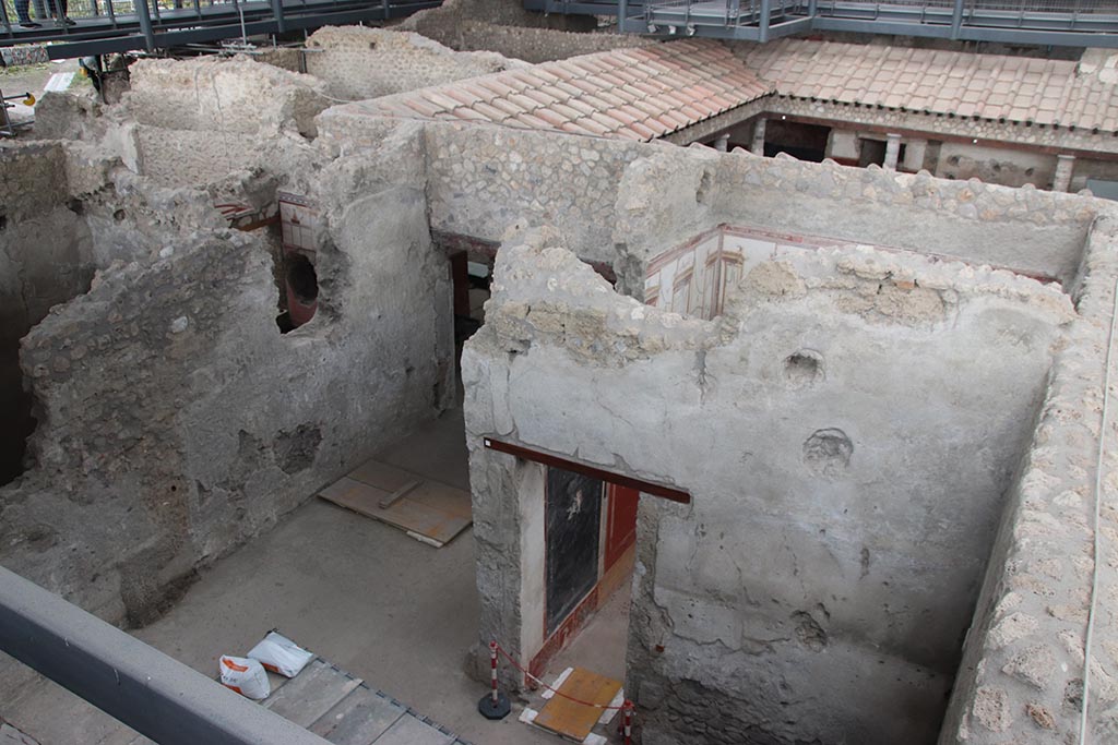 IX.12.A/IX.12.9 Pompeii. October 2024. Looking north-east into room 17, and doorway into room 18. Photo courtesy of Klaus Heese.