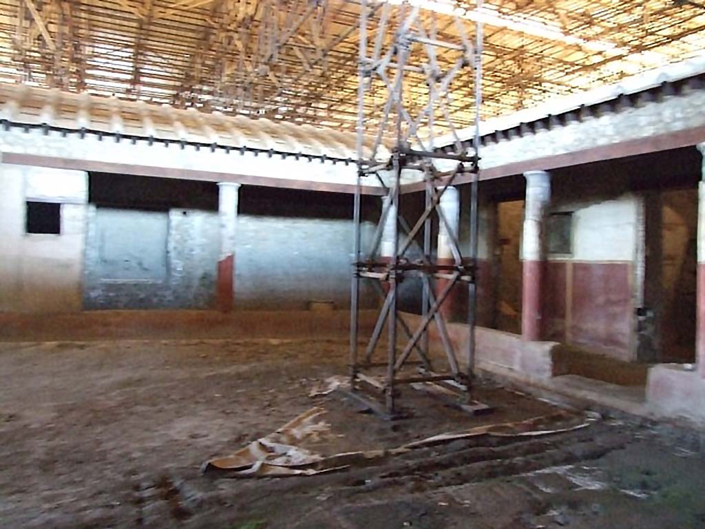 IX.12.9 Pompeii. December 2006. Garden area 5, looking north-west towards west and north portico, from outside room 1.