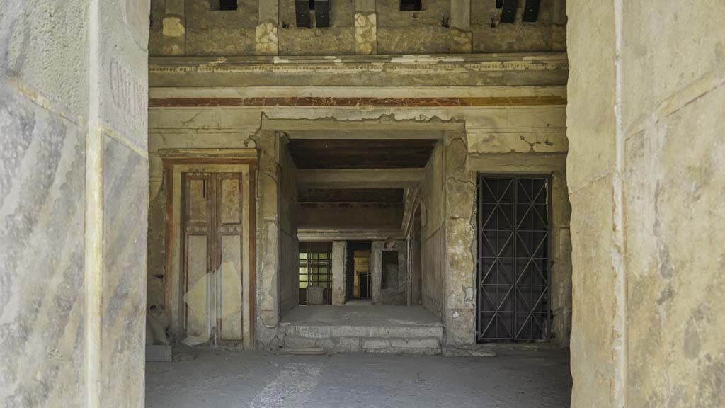 IX.13.1-3 Pompeii, August 2021. 
Room 1, looking north from entrance doorway towards room 28, in centre. Photo courtesy of Robert Hanson.
