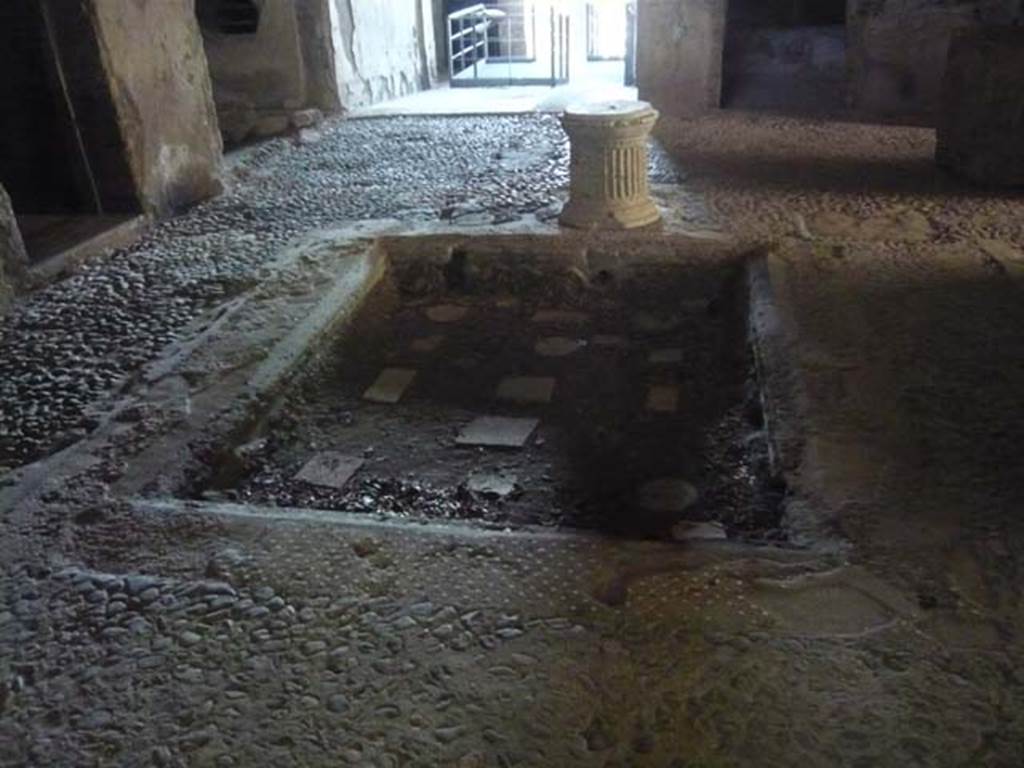 IX.13.1-3 Pompeii. May 2012. Room 2, atrium. Looking south across impluvium. 
Photo courtesy of Buzz Ferebee.
