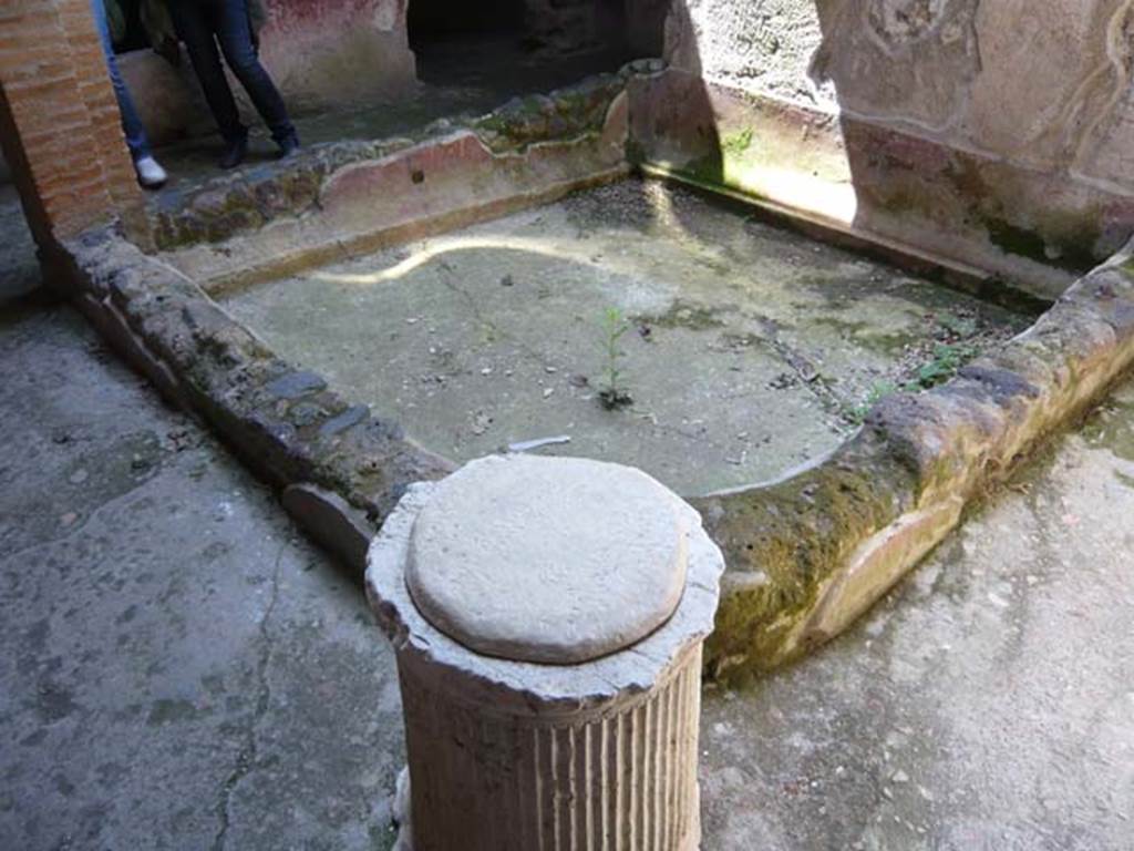 IX.13.1-3 Pompeii. May 2012. Room 21, impluvium in kitchen courtyard, looking south-west. Photo courtesy of Buzz Ferebee.