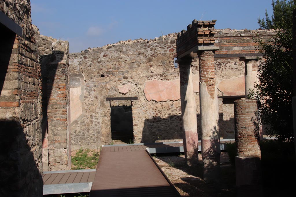 HGW24 Pompeii. Villa of Diomedes. October 2023. 
Looking north towards north-west corner of peristyle, and doorway in north wall. Photo courtesy of Klaus Heese.
