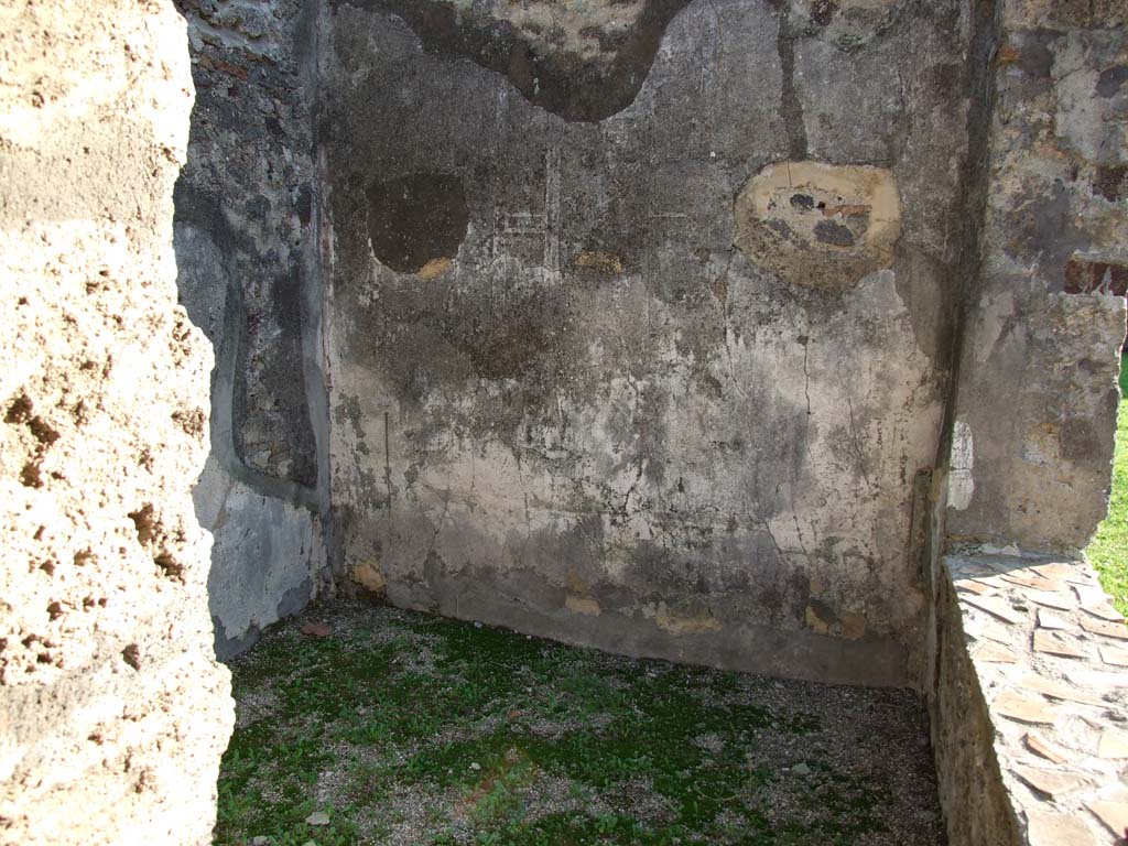HGW24 Pompeii. December 2006. Looking south into room with window overlooking terrace. 
According to PAH, I,1,250 (and Addendum, p.118, dated 21st February 1771), this room was found with white plaster decorated with some painted yellow lines, and around it some medallions and masks. The floor was paved with simple slabs.
(Villa Diomedes Project – area 34).
(According to Fontaine, this room 2.6, would have been the room from where the medallions of masks and views would have been cut from).
(No.2 on the plan by La Vega).
