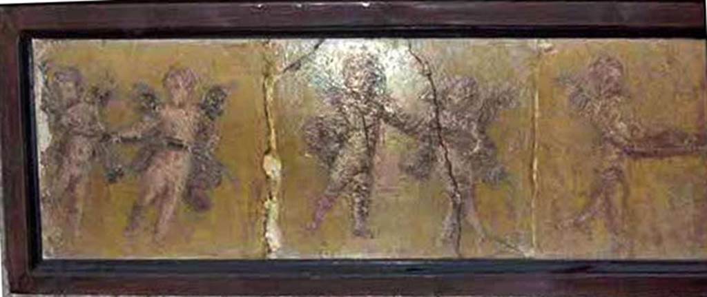 HGW24 Pompeii. Left hand half of cupids fresco showing three cupid panels in which each pair is carrying an attribute of a god.
Now in Naples Archaeological Museum. Inventory number 9203.
