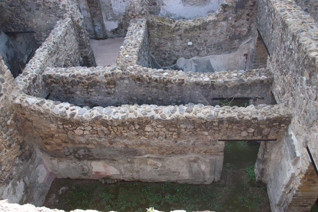 HGW24 Pompeii. Villa of Diomedes. October 2023. 
Looking south, down onto lower area to south of terrace. Photo courtesy of Klaus Heese.
(Fontaine, looking across rooms (from upper left) 5,4, stairs to lower floor, rooms 5,1 and 5,4, upper centre.
In centre - corridor 5,3, and south wall of room 5,5, on lower side. 
