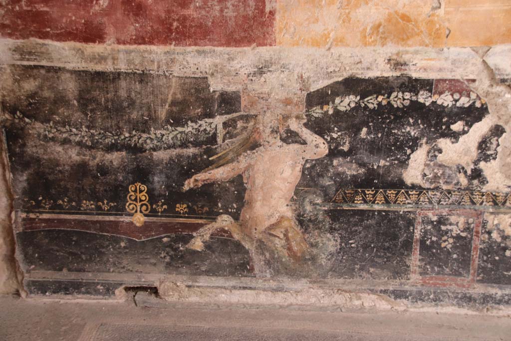 Villa San Marco, Stabiae, September 2019. Room 44, detail of painted centaur on zoccolo of west wall of atrium in south-west corner.
Photo courtesy of Klaus Heese.
