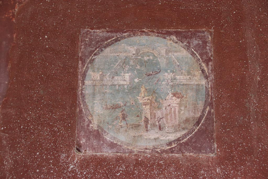 Villa San Marco, October 2022. Room 20, reproduction of medallion from east wall, (to the right of the hole in the wall). 
(original now in Naples Archaeological Museum, inventory number 9408A.)  Photo courtesy of Klaus Heese.
