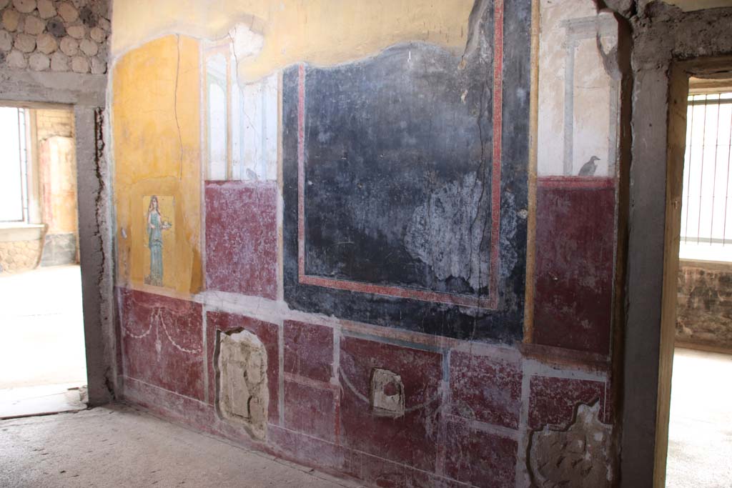 Villa San Marco, Stabiae, September 2019. Room 50, west wall with doorway to room 30, on right. 
Photo courtesy of Klaus Heese.
