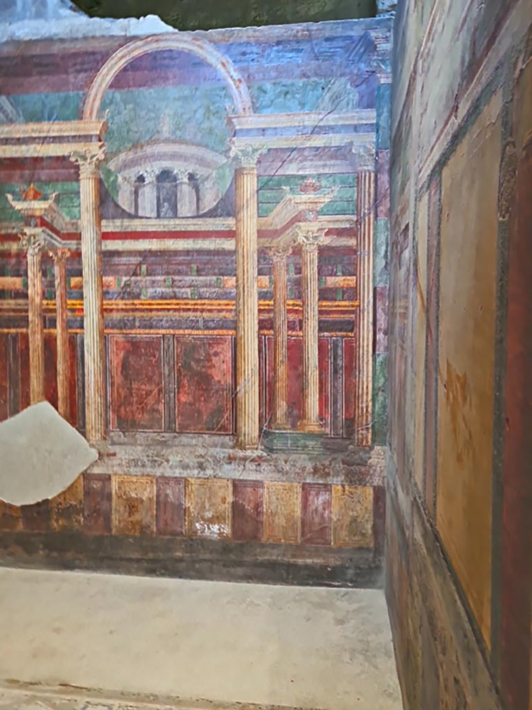 Villa of Mysteries, Pompeii. November 2023. 
Room 16, looking south along west wall into south-west corner. Photo courtesy of Giuseppe Ciaramella.
