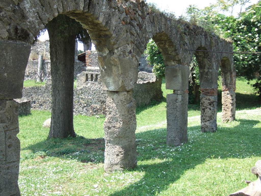 Via dei Sepolcri. East side. Looking north. Colonnade on unnamed vicolo which may possibly have led to the front of the Villa of Mysteries. May 2006.