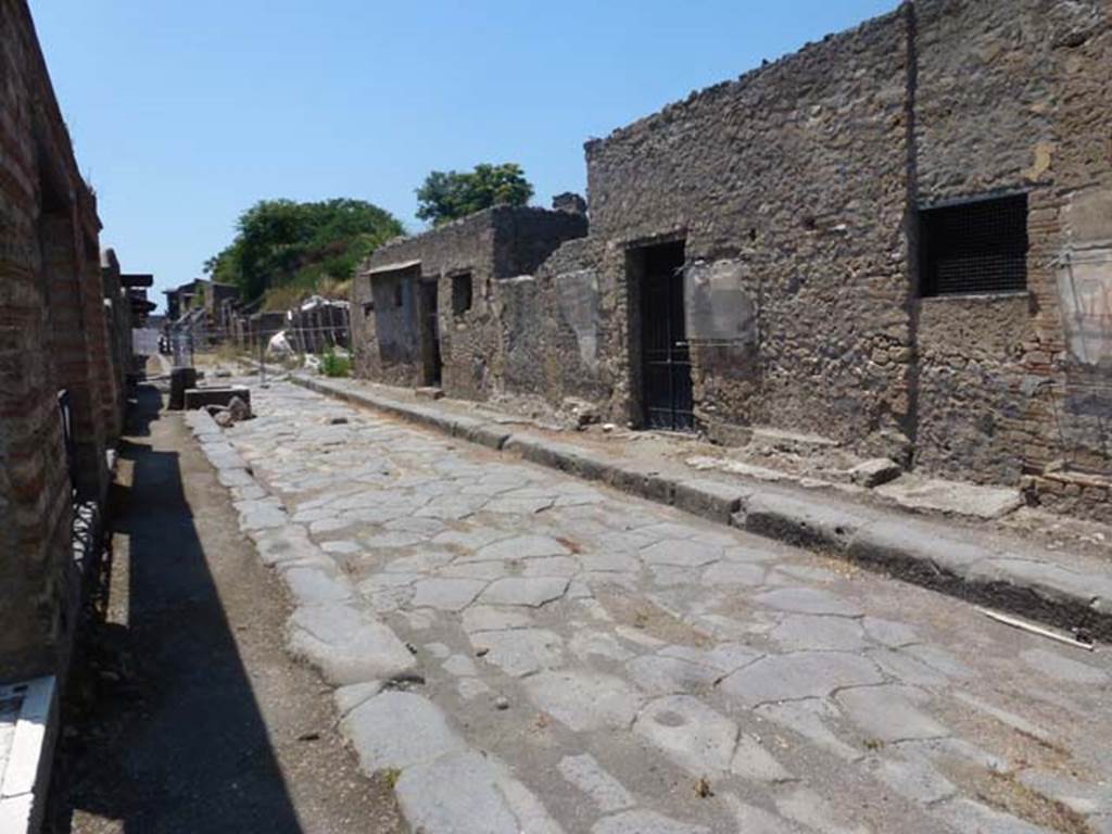 Via dell’Abbondanza. June 2012. Looking west along III.4 on north side, from near II.1.6. Photo courtesy of Michael Binns.