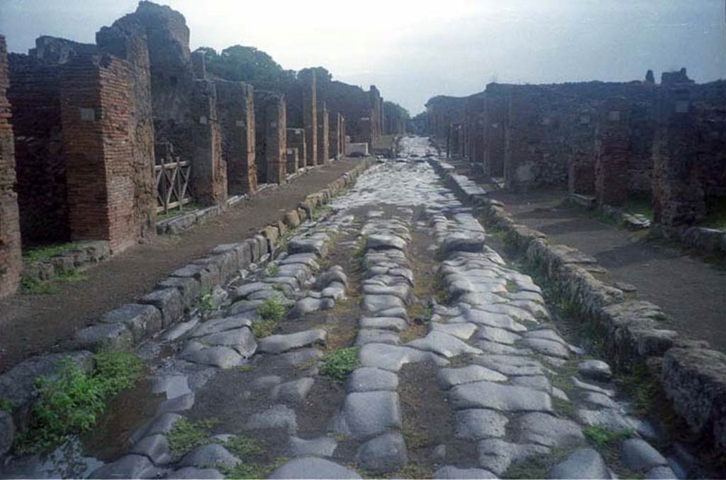 Via della Fortuna. July 2011. Looking east between VI.14 and VII.3. Photo courtesy of Rick Bauer.