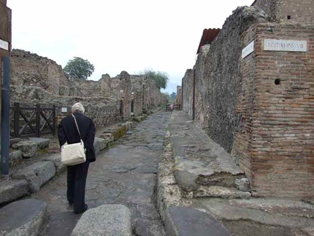 Via delle Terme, north side. May 2010. Looking north at junction with Vicolo della Fullonica between VI.6 and VI.8.