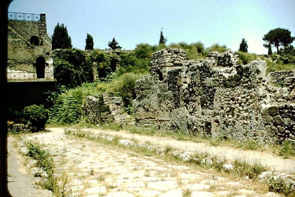 Via di Mercurio, Pompeii. 1957. Looking north towards Tower XI, and exterior wall of VI.9.1. 
Photo by Stanley A. Jashemski.
Source: The Wilhelmina and Stanley A. Jashemski archive in the University of Maryland Library, Special Collections (See collection page) and made available under the Creative Commons Attribution-Non Commercial License v.4. See Licence and use details.
J57f0344

