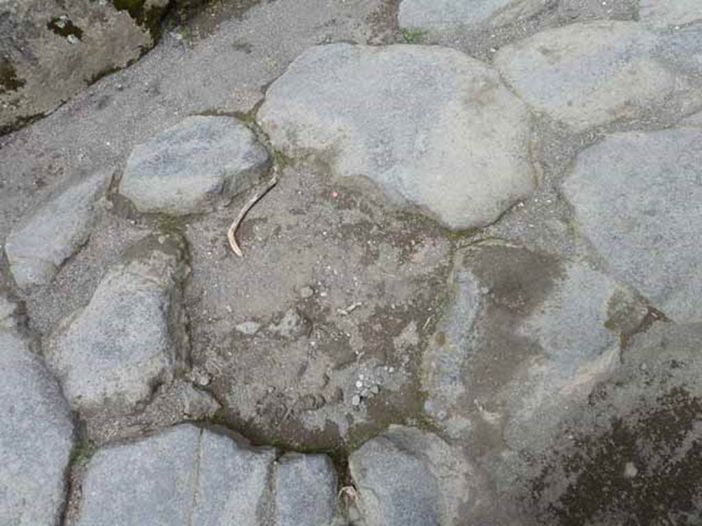 Vicolo Storto. May 2010. Detail of road surface with missing lava block near VII.4.44.