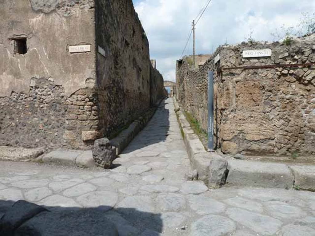 Vicolo del Citarista, May 2010. Looking north between I.4 and I.6, from Vicolo del Menandro.