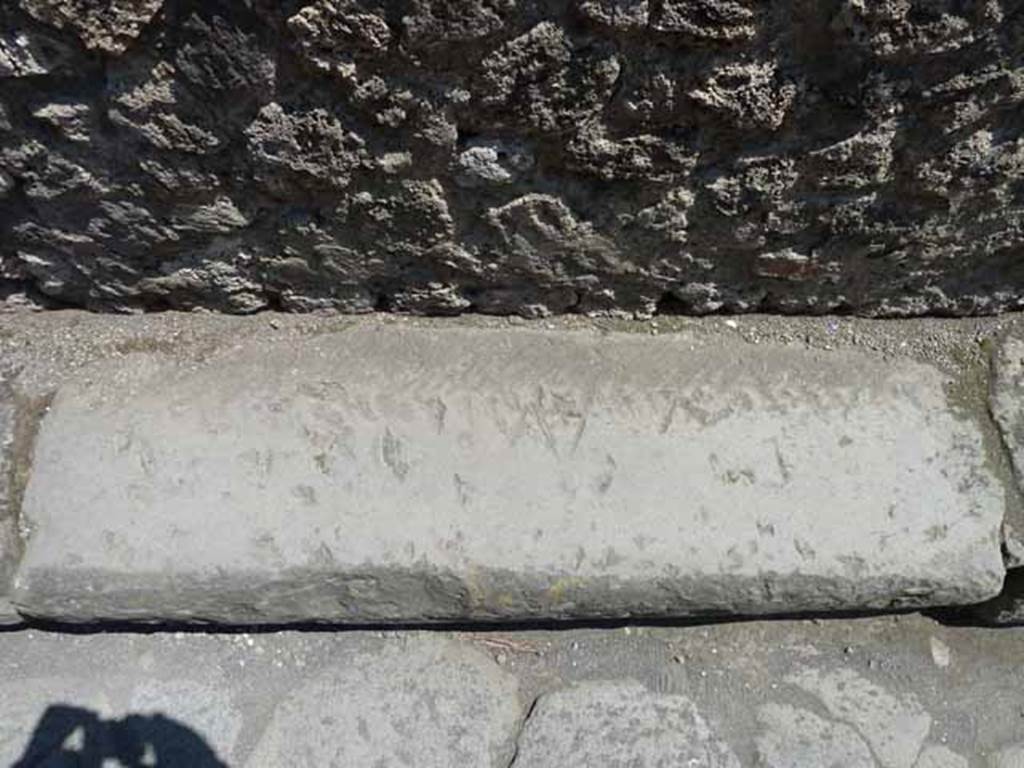 Vicolo della Maschera, east side, May 2010. Mason’s marks in road edging.