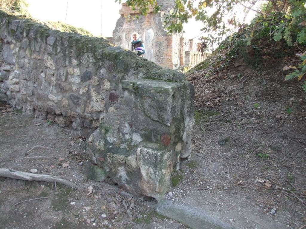 HGW05 Pompeii. December 2007. The stone wall behind and to left of pillar has been built across the Via Pomeriale. The corner was the site of a street altar. The serpent painting stood at the intersection of the so-called Via Pomeriale and the Via dei Sepolcri near tomb 5 
PAH 1, I, 234 (Aug 12th 1769).  See Pompeii: Scienza et Societa page 26.
