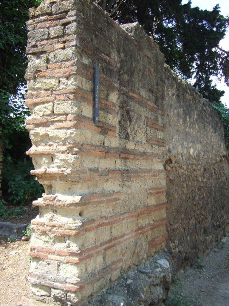 HGW15a Pompeii. May 2006. This entrance is in the west side of the shop HGW15. It leads in to the Villa of Cicero and is numbered separately as 15a by SANP. The strip on the outside wall says Villa detta di Cicerone (Villa said to be that of Cicero).
