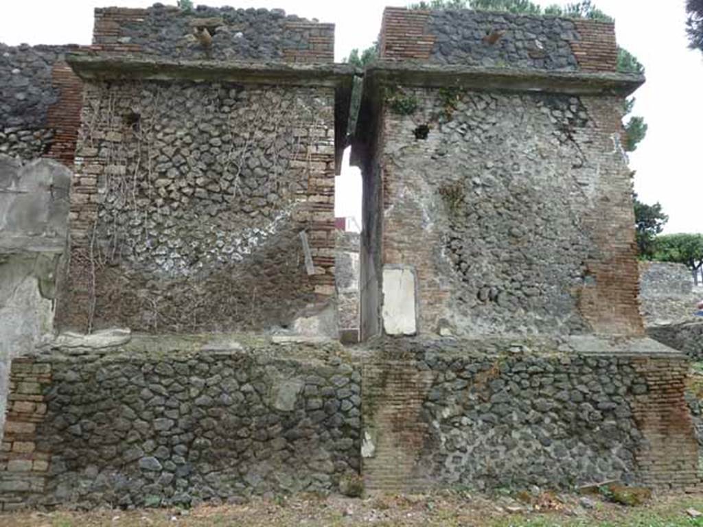 Pompeii Porta Nocera. May 2010. Tombs 12EN and 10EN, rear north sides. Looking south. 