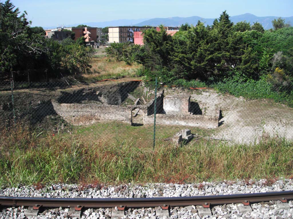 Pompeii Porta Sarno Necropolis. June 2012. Monumental tomb A (right) and enclosure with tomb B (left). Photo courtesy of Ivo van der Graaff.