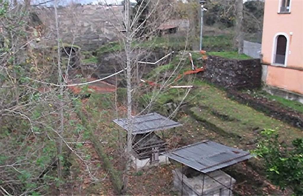 SG4 Pompeii. 2015. Tombs SG4 and SG5, with roofing and scaffolding, with Porta Stabia in the background.