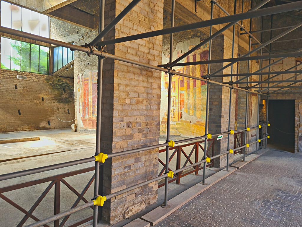 Oplontis Villa of Poppea, October 2023. 
Room 4, south side, looking west through pilasters into the atrium, room 5. Photo courtesy of Giuseppe Ciaramella. 
