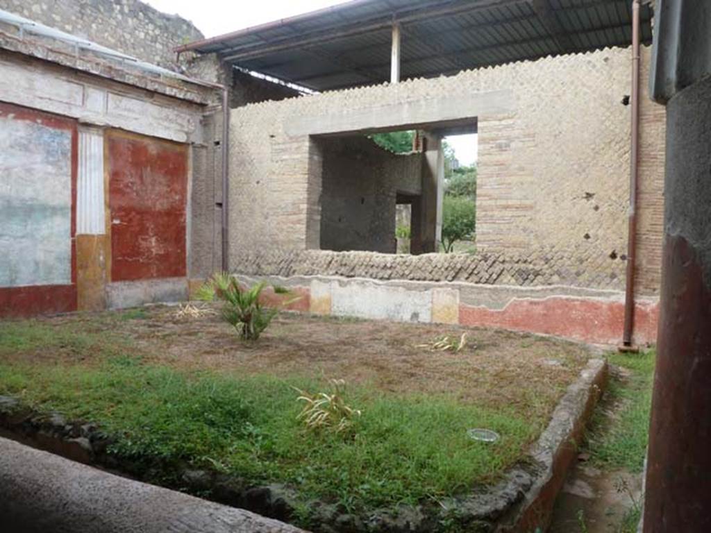 Oplontis, September 2015. Room 4, looking north-west across courtyard garden, room 20, and through window into large salon, room 21. 
