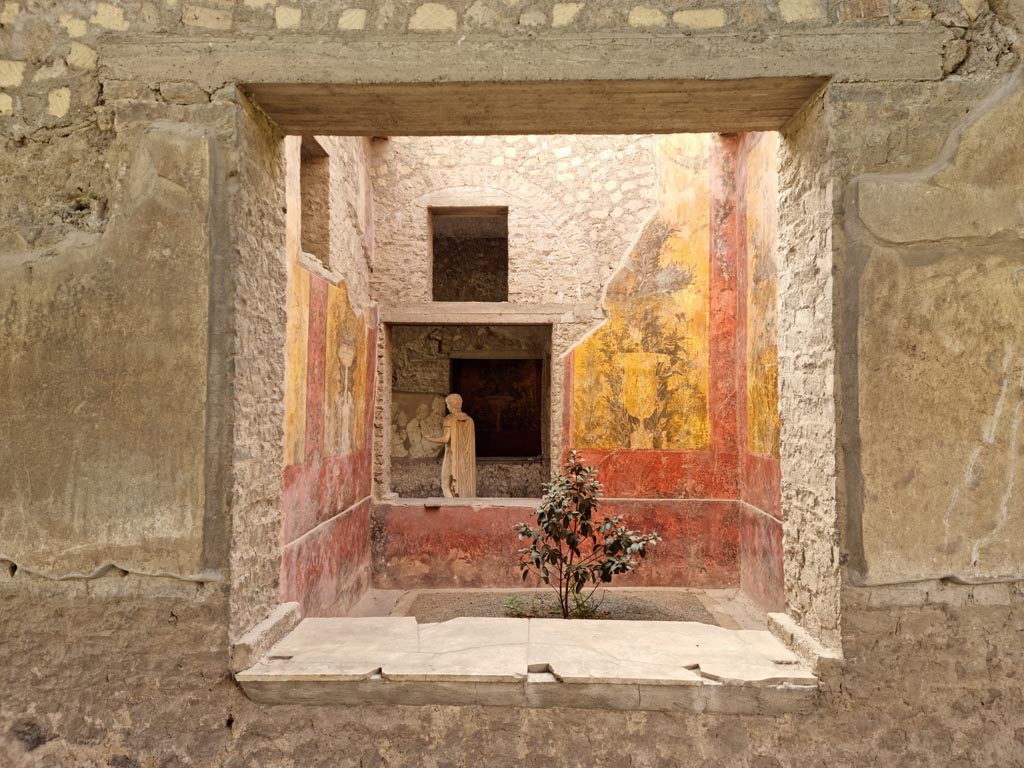 Oplontis Villa of Poppea, January 2023. 
Room 68, looking through window towards south wall with window into room 65, looking across to window into room 61, a raised courtyard. 
Photo courtesy of Miriam Colomer.

