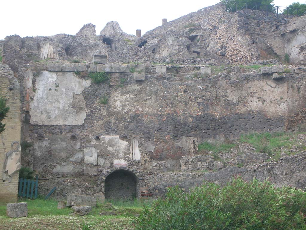 VIII.2.A, on left, with VIII.2.1, extreme right, Pompeii. May 2010. Looking north from rear of houses. Photo courtesy of Ivo van der Graaff.