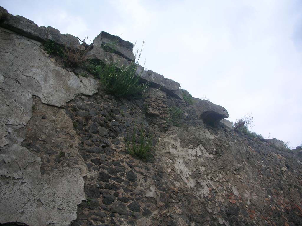 VIII.2.A Pompeii. May 2010. Detail of walling at west end, looking east. Photo courtesy of Ivo van der Graaff.