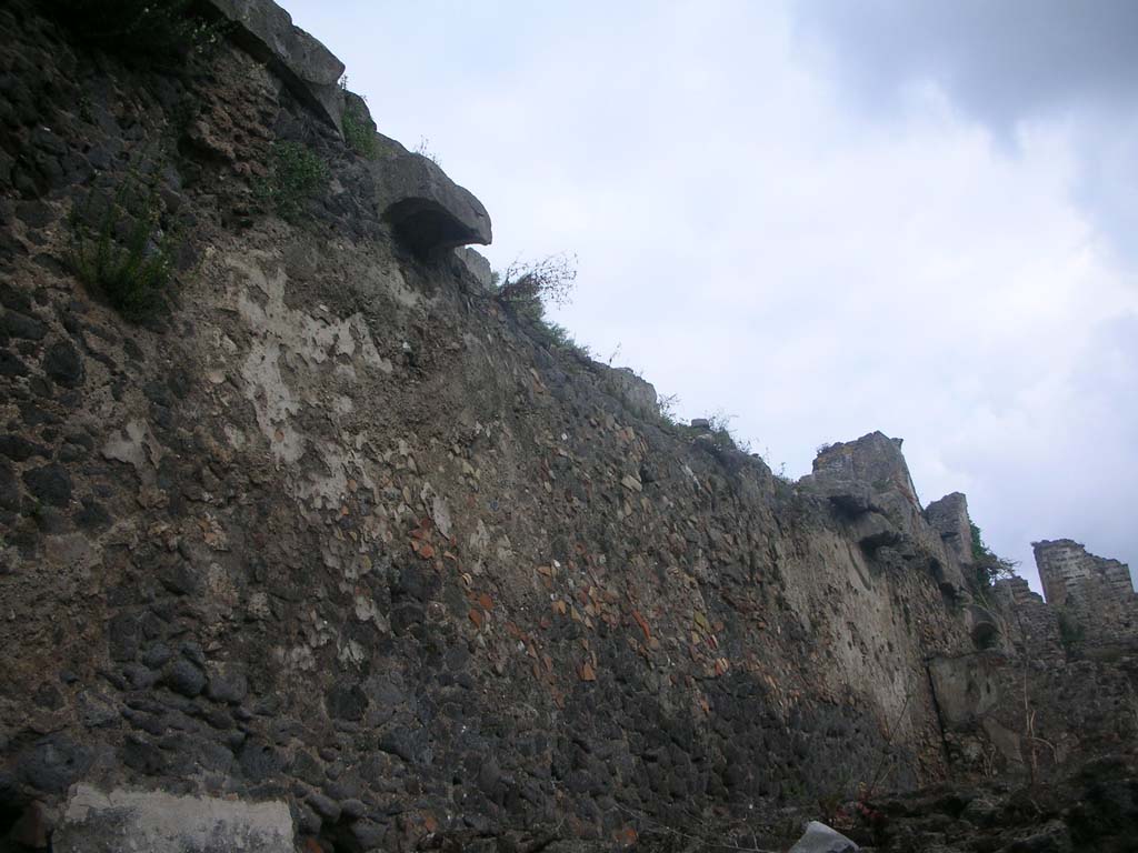 VIII.2.A Pompeii. May 2010. Detail of walling at west end, looking east. Photo courtesy of Ivo van der Graaff.