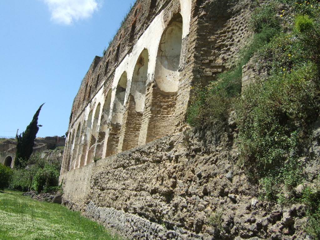 VIII.2.20 Pompeii. May 2006. Remains of city walls under rear of Sarno baths, looking north-west.